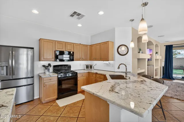 a view of a living room and dining room