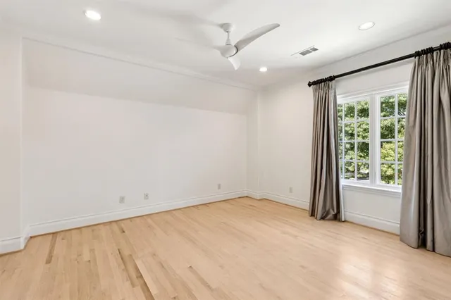 an empty room with a natural light