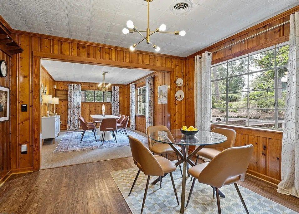 264 Euharlee Road Southwest Cartersville, GA 30120 - Photo 14 of 45 a dining room with furniture a chandelier and wooden floor