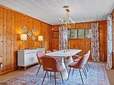 264 Euharlee Road Southwest Cartersville, GA 30120 - Photo 15 of 45 a dining room with furniture a chandelier and wooden floor