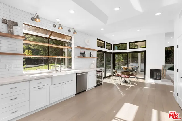 a view of a chairs and table in the yard