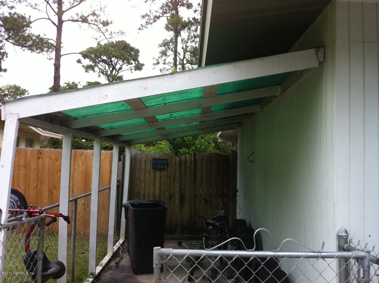 7043 Altama Road Jacksonville, FL 32216 - Photo 2 of 13 Storage on side of home