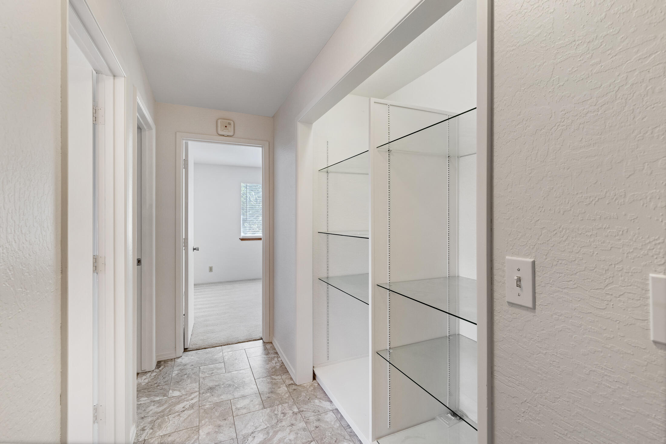 946 West Harbeck Road Grants Pass, OR 97527 - Photo 10 of 31 Hallway with lots of storage