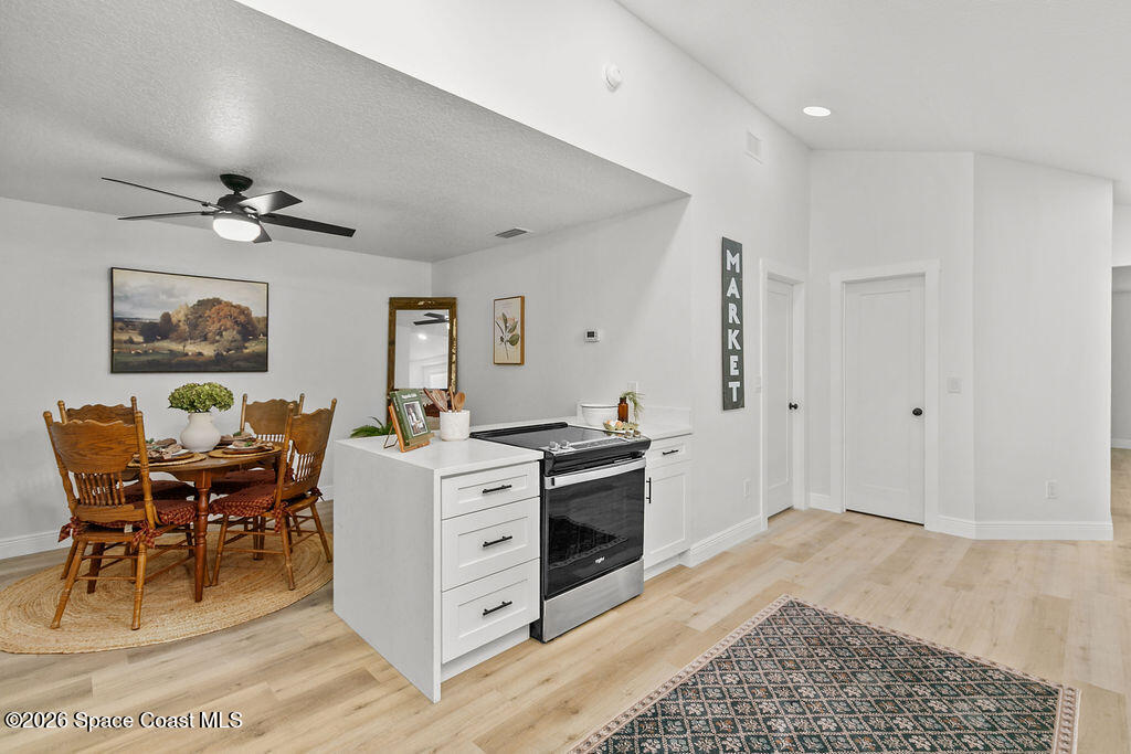 1815 Ford Road Mims, FL 32754 - Photo 15 of 59 a living room with furniture and a table