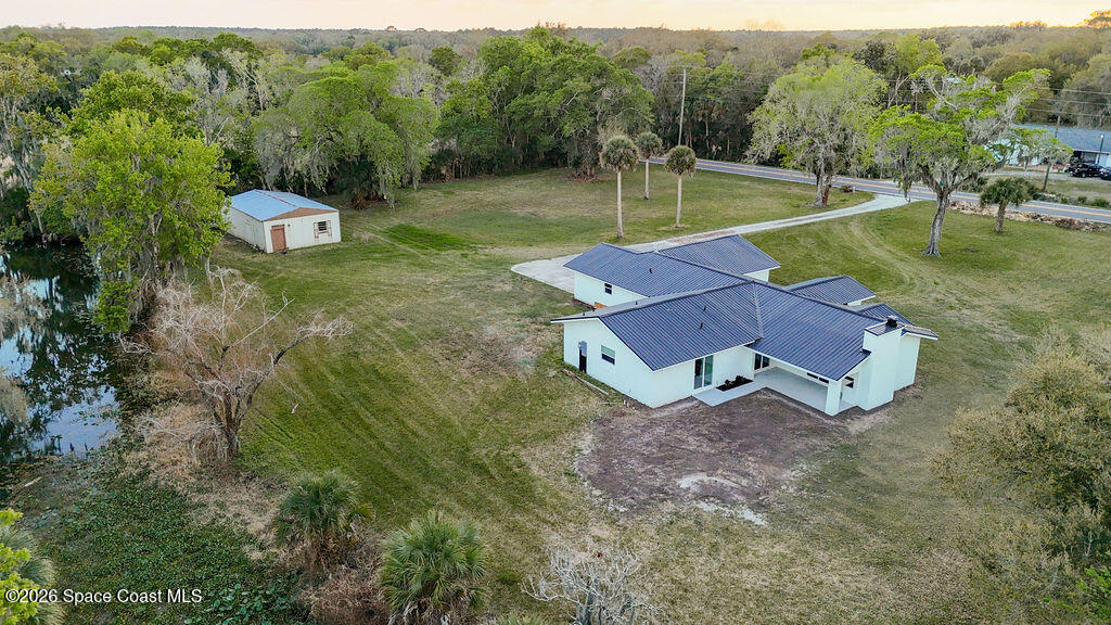 1815 Ford Road Mims, FL 32754 - Photo 56 of 59 a view of a backyard