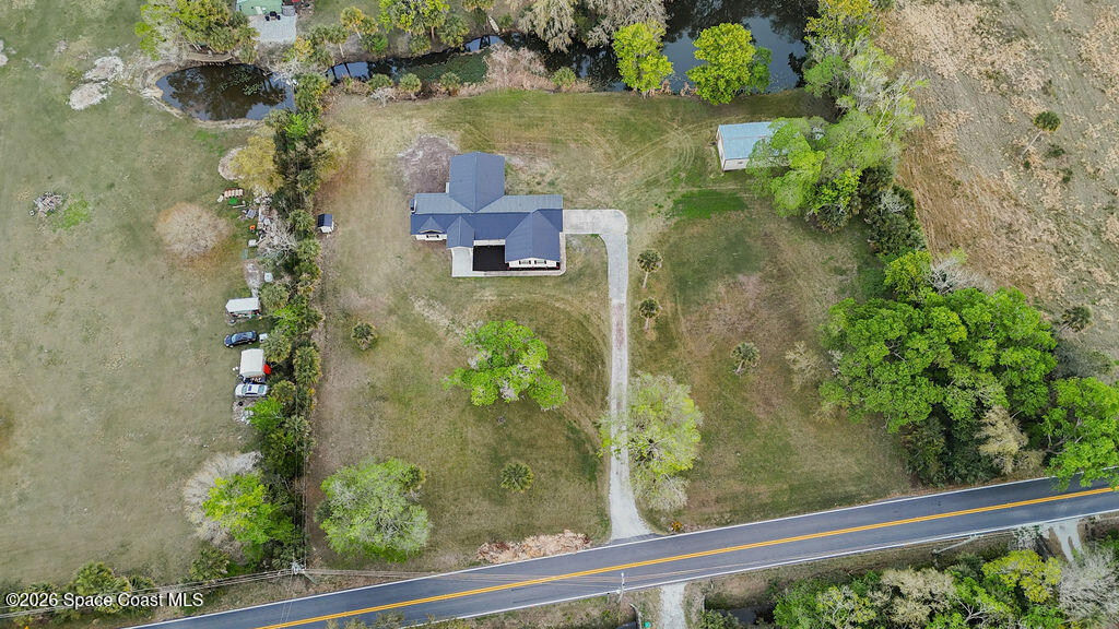 1815 Ford Road Mims, FL 32754 - Photo 57 of 59 a view of a lake from a balcony