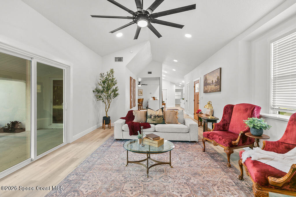 1815 Ford Road Mims, FL 32754 - Photo 6 of 59 a living room with furniture and a large window