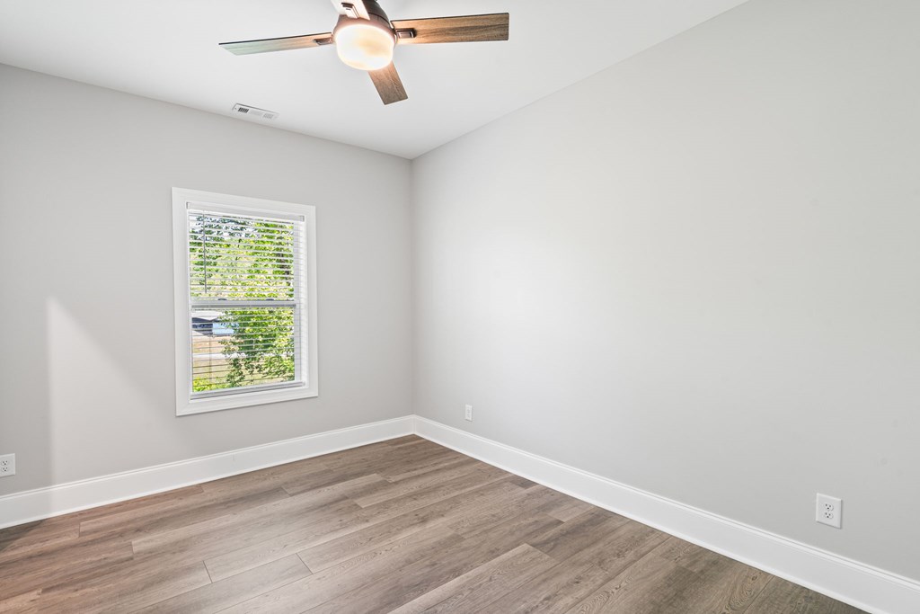 91 Dewey Ridge Lane Hayesville, NC 28904 - Photo 36 of 40 wooden floor in an empty room with a window