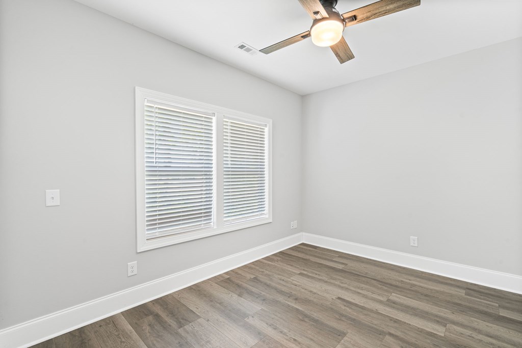 91 Dewey Ridge Lane Hayesville, NC 28904 - Photo 37 of 40 a view of an empty room with wooden floor and a window