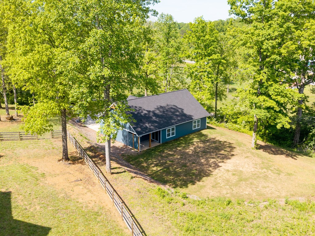 91 Dewey Ridge Lane Hayesville, NC 28904 - Photo 10 of 40 a view of a backyard with a tree