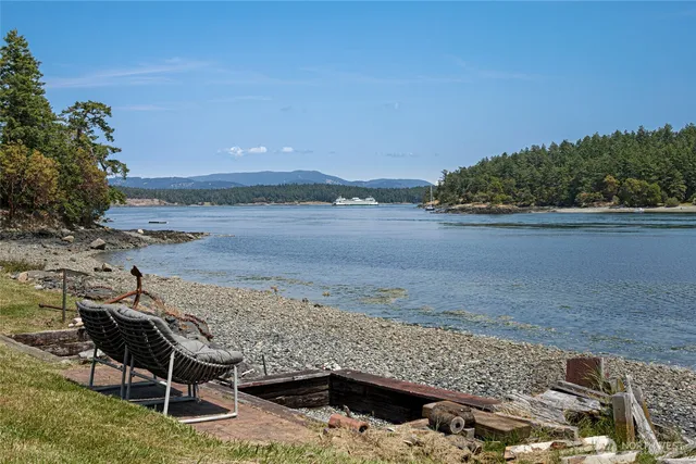 a view of a lake with a mountain in the background