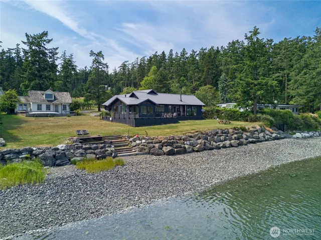 a view of a house with a big yard