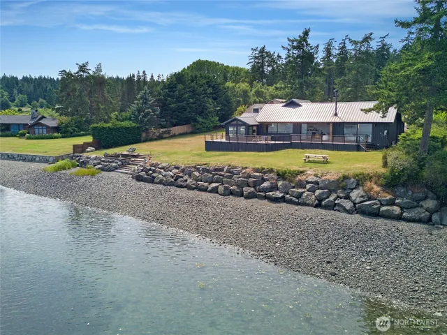 a view of a swimming pool and a yard
