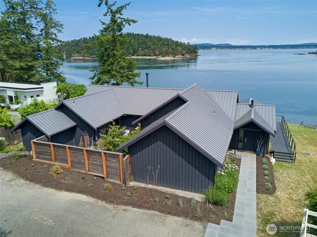 a house with river in front of it