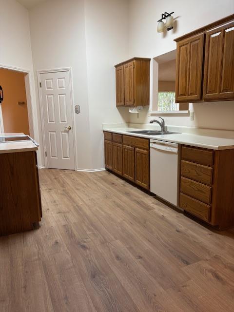 411 Fitch Street Kerrville, TX 78028 - Photo 12 of 33 a kitchen with stainless steel appliances granite countertop a sink stove and cabinets