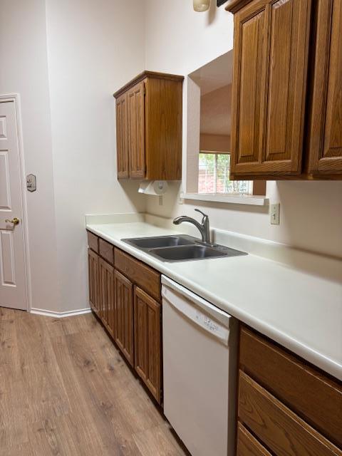 411 Fitch Street Kerrville, TX 78028 - Photo 13 of 33 a kitchen with stainless steel appliances a sink and a microwave