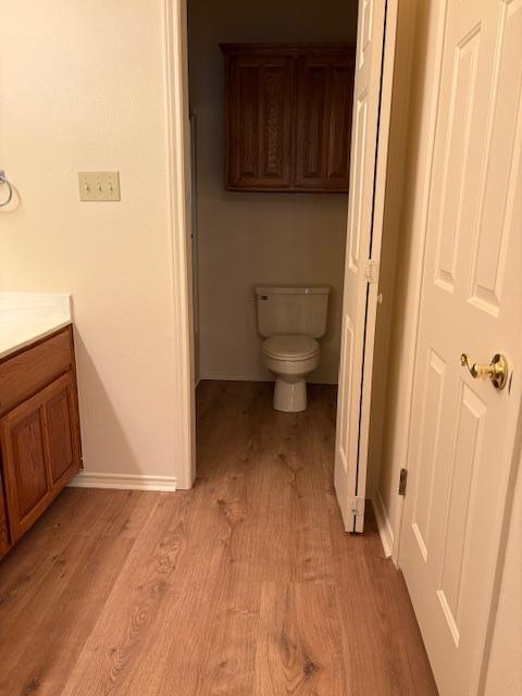411 Fitch Street Kerrville, TX 78028 - Photo 20 of 33 a view of a room with wooden floor and cabinet
