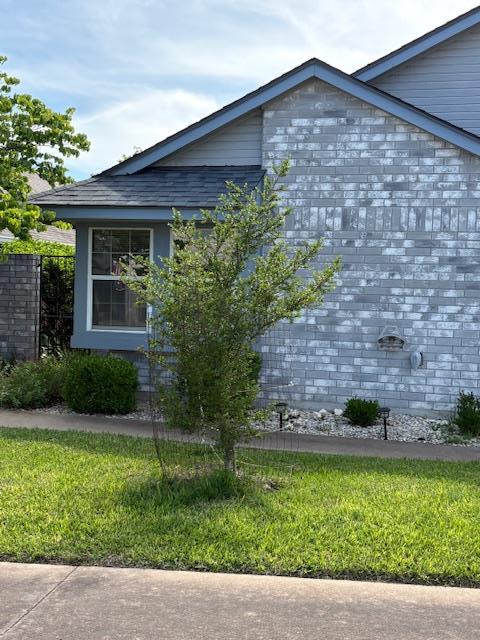 411 Fitch Street Kerrville, TX 78028 - Photo 30 of 33 front view of a house with a yard
