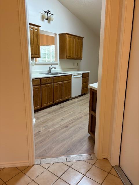 411 Fitch Street Kerrville, TX 78028 - Photo 9 of 33 a kitchen with a sink window and cabinets