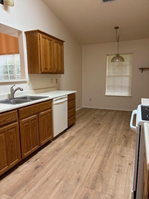 411 Fitch Street Kerrville, TX 78028 - Photo 10 of 33 a kitchen with a sink and cabinets
