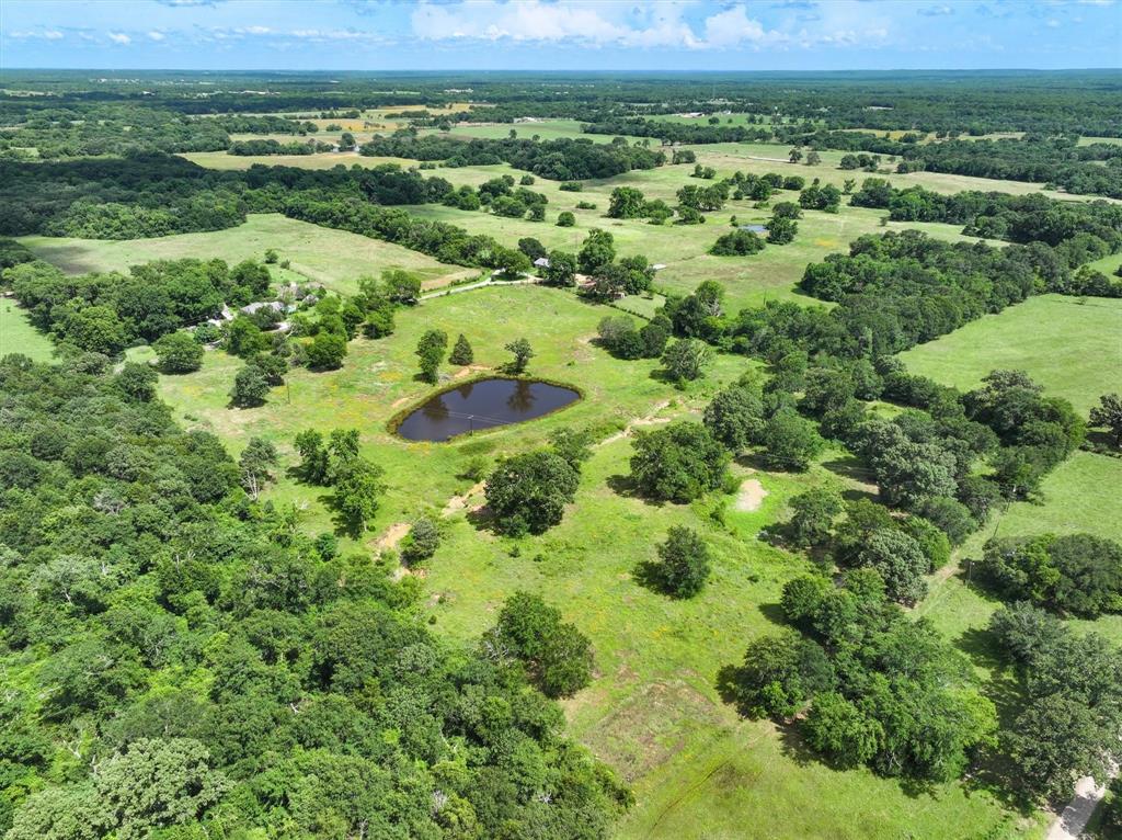 Tbd Hickory Street Van, TX 75790 - Photo 2 of 4 an aerial view of residential houses with outdoor space and trees