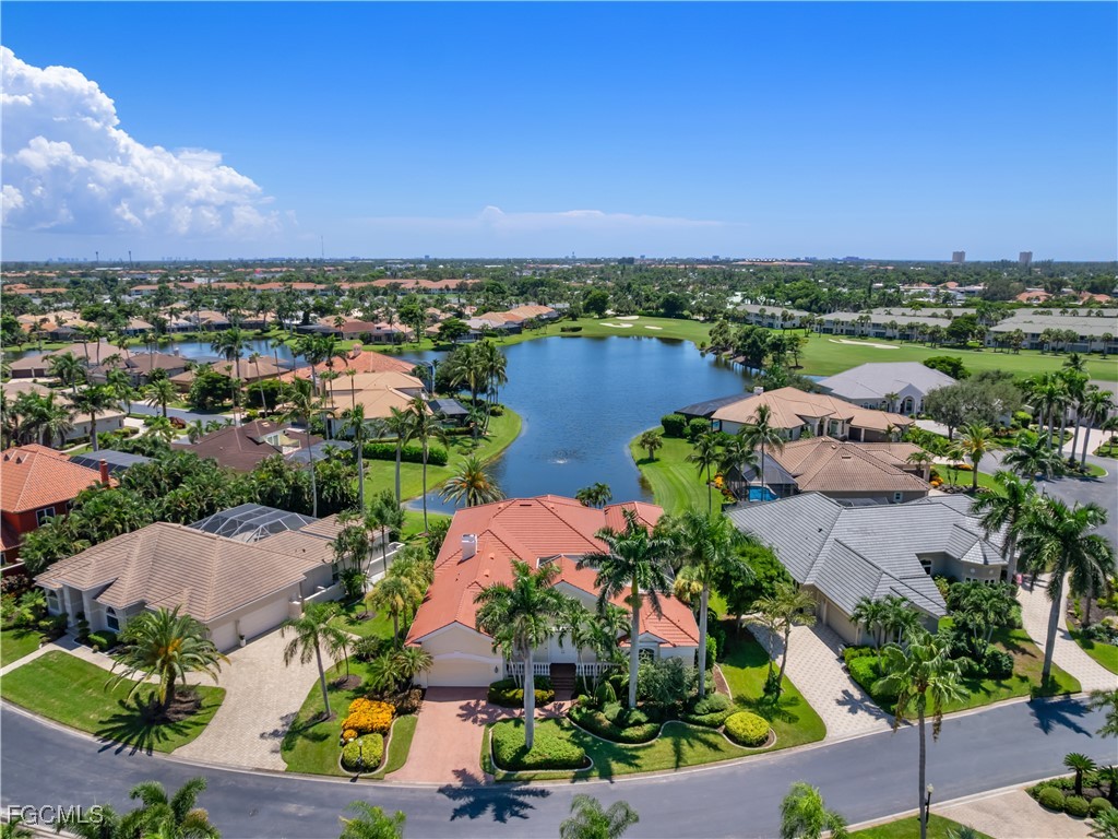 11511 Compass Point Drive Fort Myers, FL 33908 - Photo 1 of 46 an aerial view of a houses with a lake view