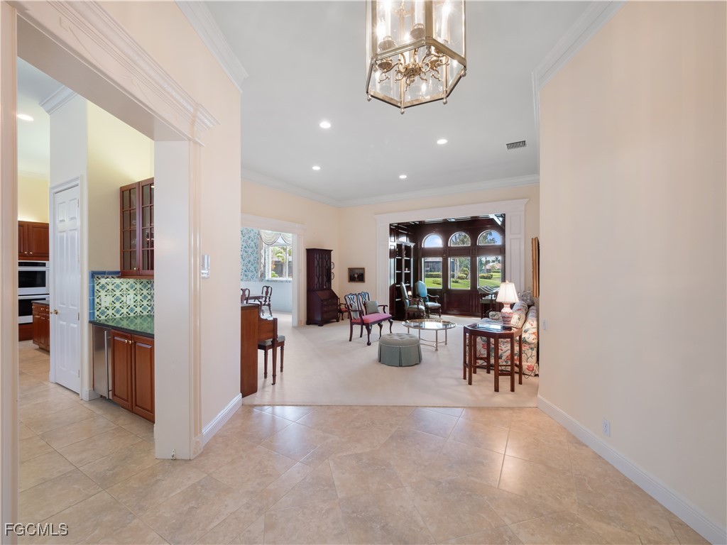 11511 Compass Point Drive Fort Myers, FL 33908 - Photo 15 of 46 a view of a dining room with furniture