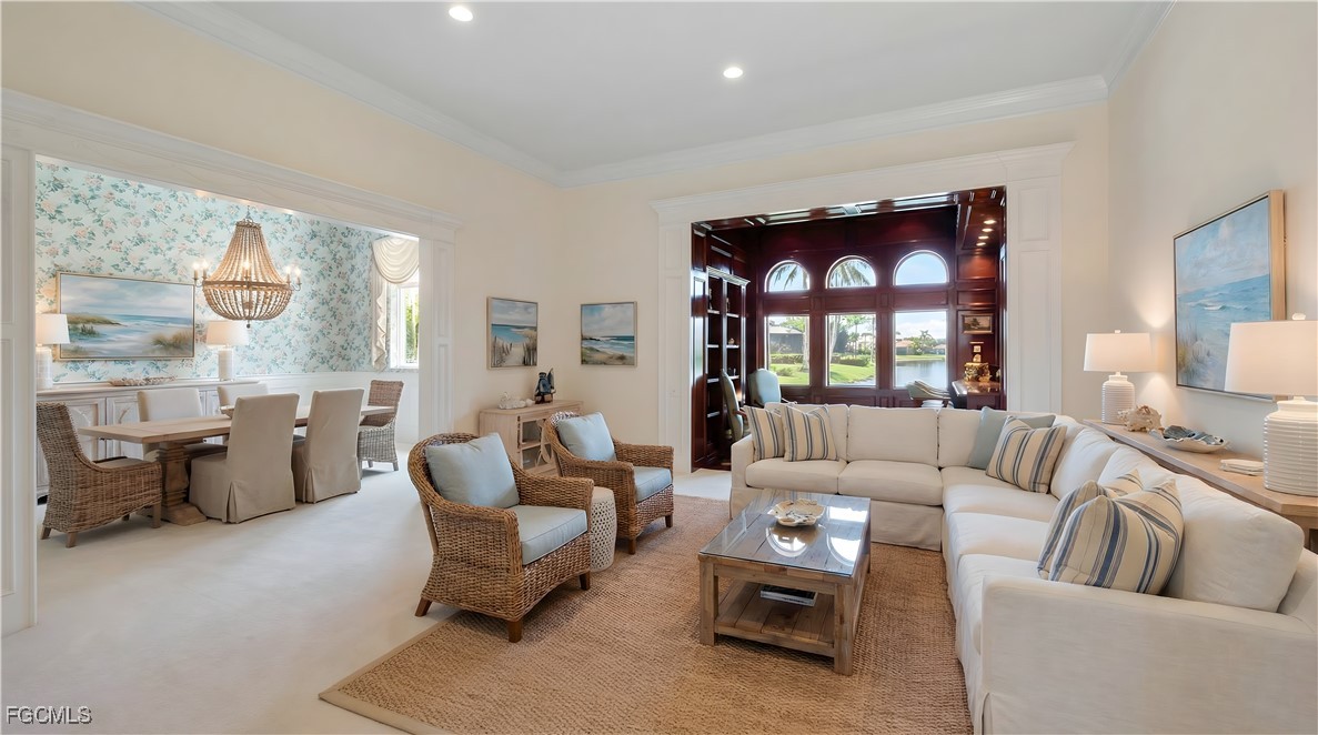 11511 Compass Point Drive Fort Myers, FL 33908 - Photo 17 of 46 a living room with furniture and a large window