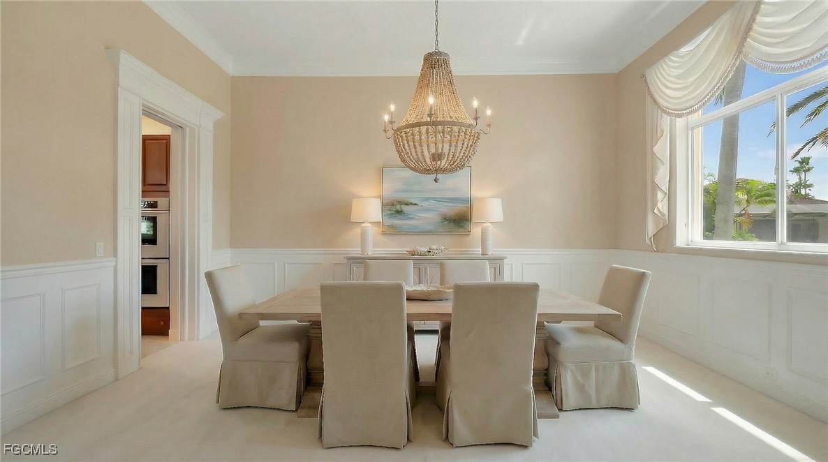 11511 Compass Point Drive Fort Myers, FL 33908 - Photo 20 of 46 a view of a dining room with furniture window and outside view