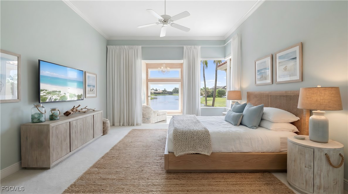 11511 Compass Point Drive Fort Myers, FL 33908 - Photo 22 of 46 a bedroom with a large bed and a flat screen tv