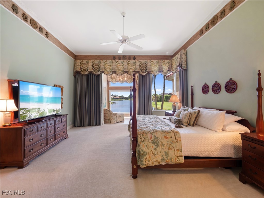 11511 Compass Point Drive Fort Myers, FL 33908 - Photo 23 of 46 a bedroom with bed and window