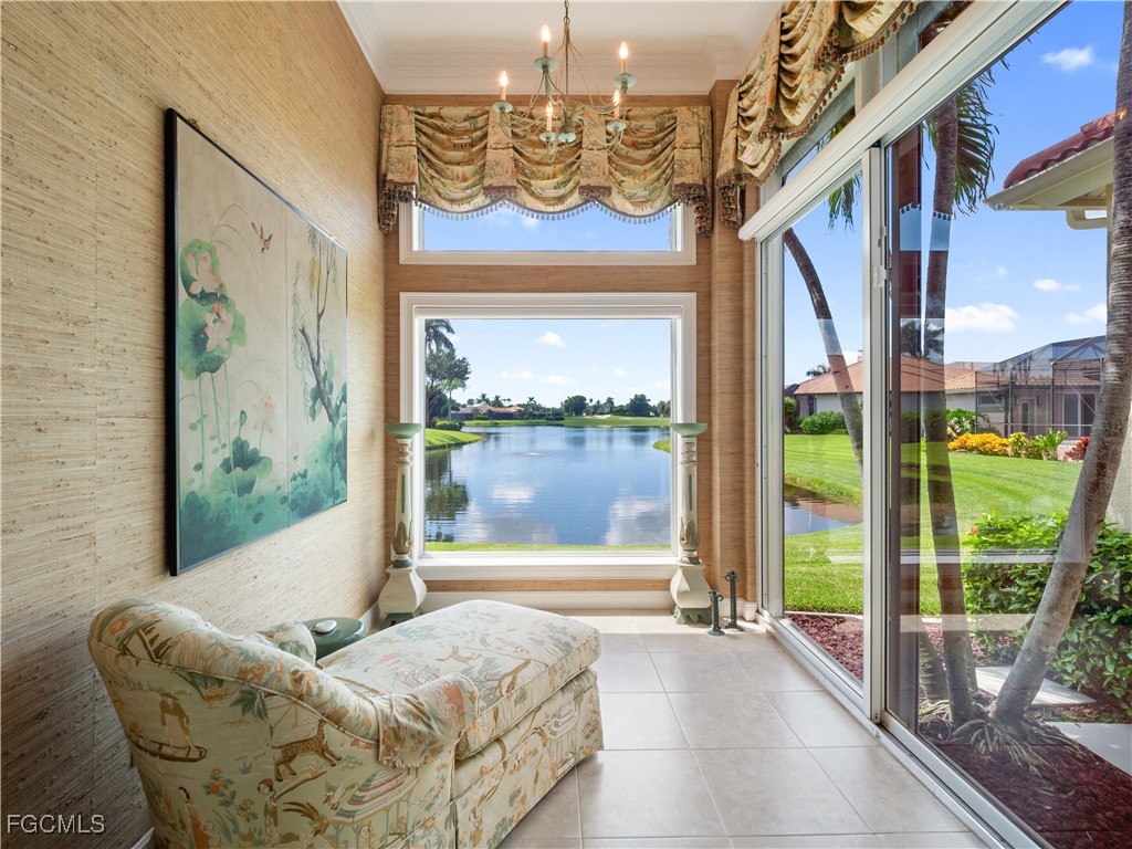 11511 Compass Point Drive Fort Myers, FL 33908 - Photo 24 of 46 a bedroom with furniture and a large window