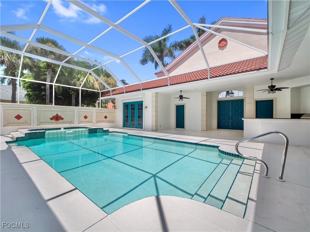 11511 Compass Point Drive Fort Myers, FL 33908 - Photo 30 of 46 a view of a patio with a table and chairs