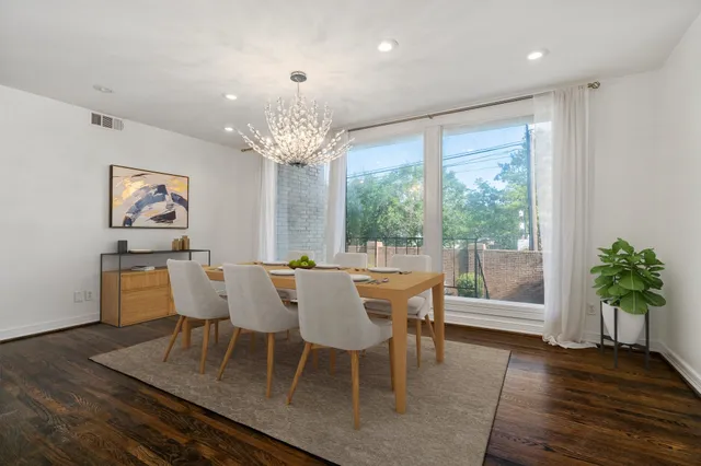 a kitchen with stainless steel appliances granite countertop a sink and cabinets