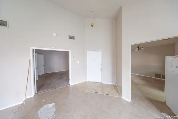 an empty room with a bathroom