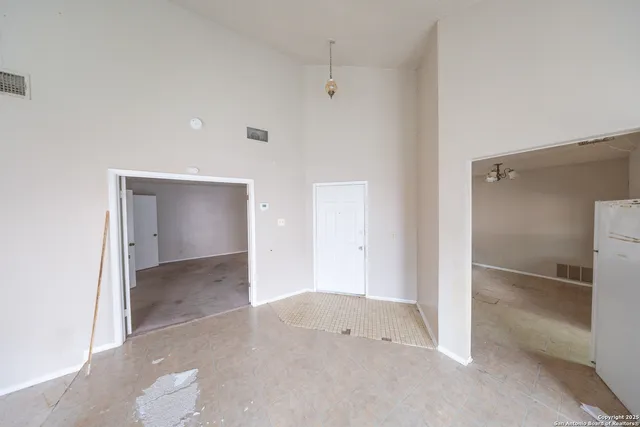 an empty room with a bathroom