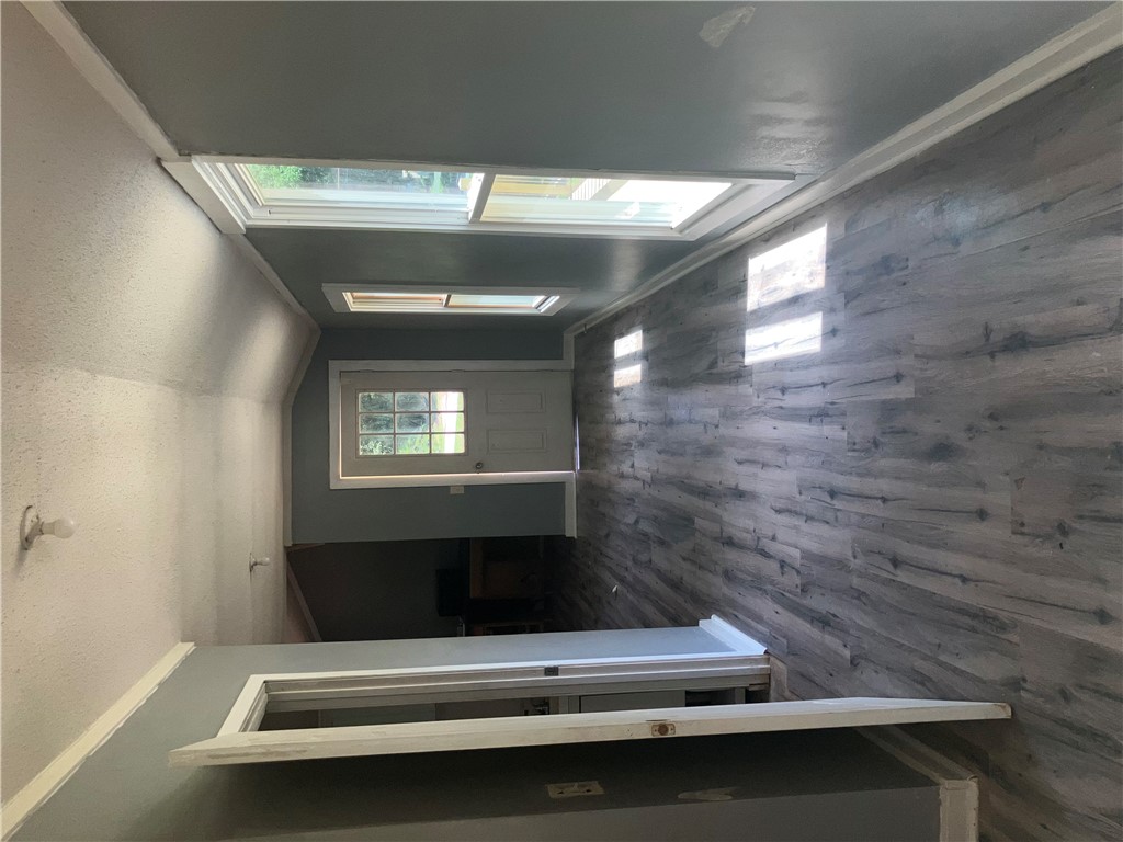 1401 Lebanon Road Pendleton, SC 29670 - Photo 2 of 8 Illuminated by skylights, a well-lit hallway leads to a private entrance.