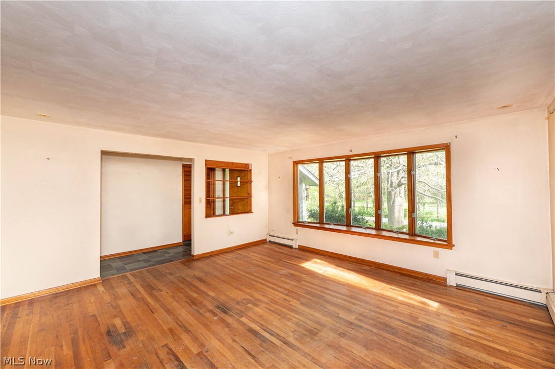 12310 Huntoon Road Painesville, OH 44077 - Photo 5 of 48 Enjoy the large bow window and abundant natural lighting in the spacious living room