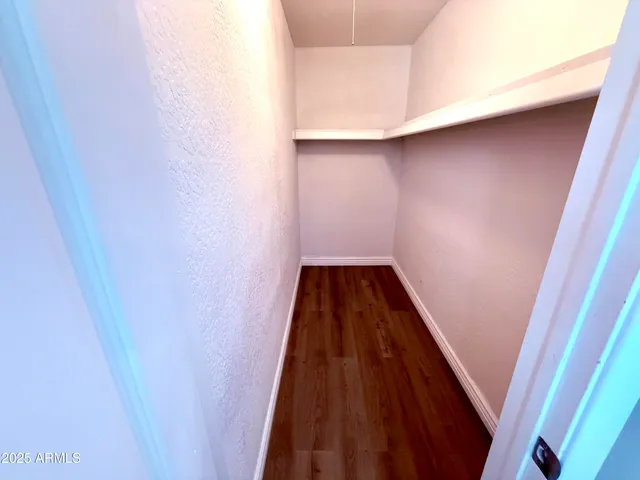 a bathroom with a tub sink and toilet