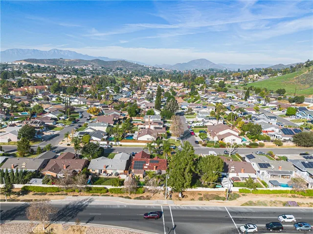 an aerial view of city and green space