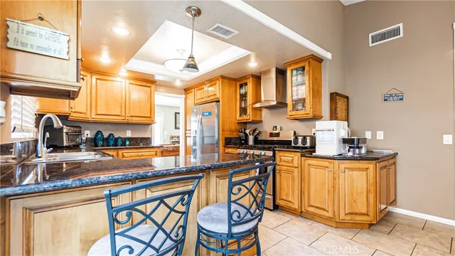 a living room with a table and chairs
