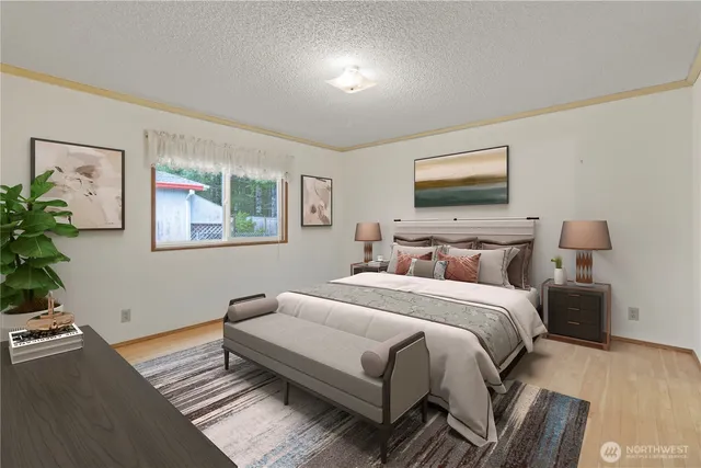 a bedroom with bed and a window