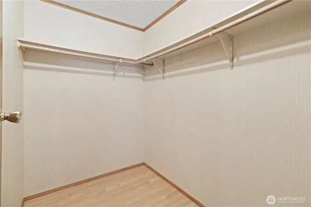 a view of a room with racks on the wall