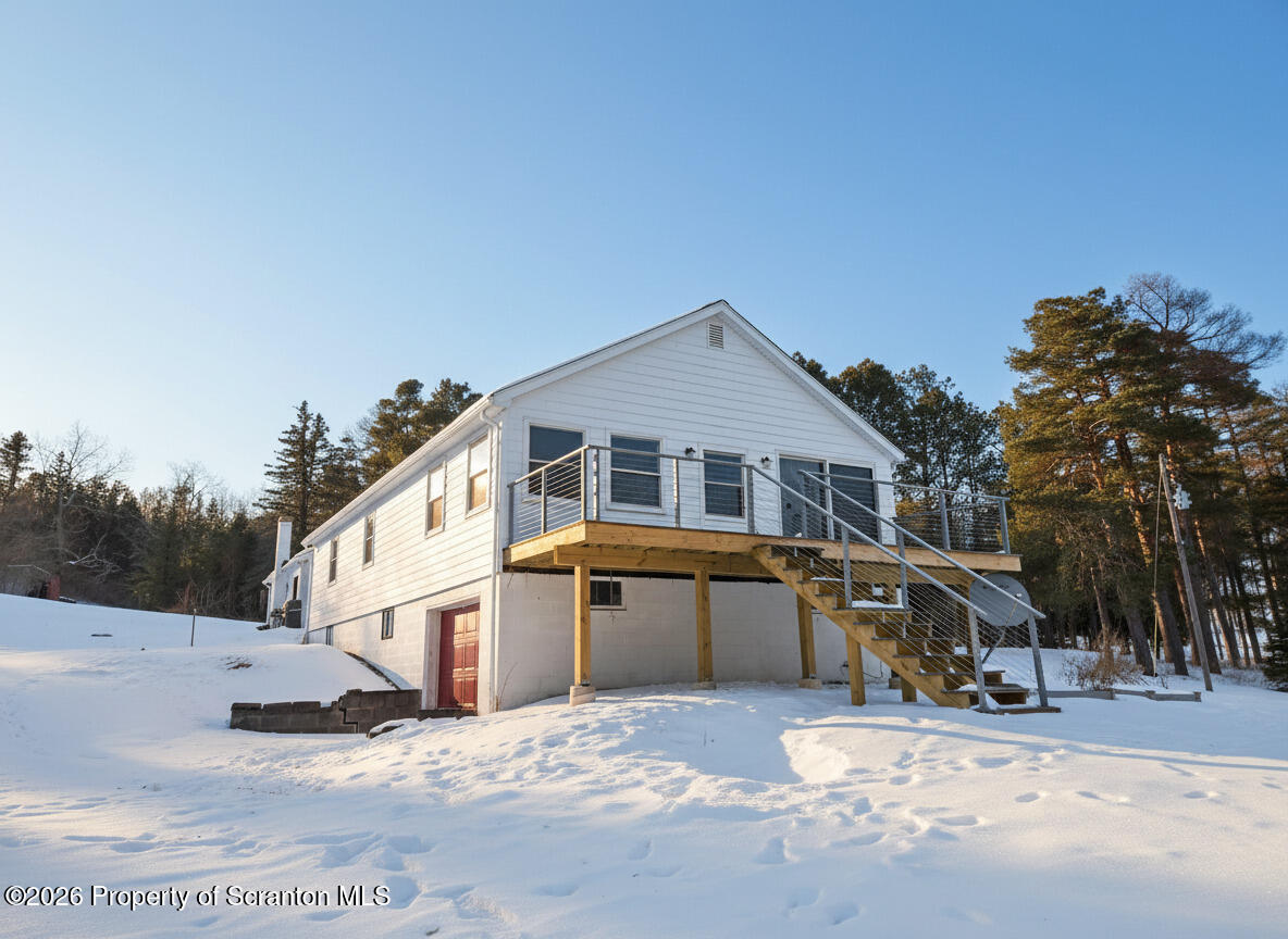 915 Sugar Hollow Road Tunkhannock, PA 18657 - Photo 2 of 48 a view of a house with a yard