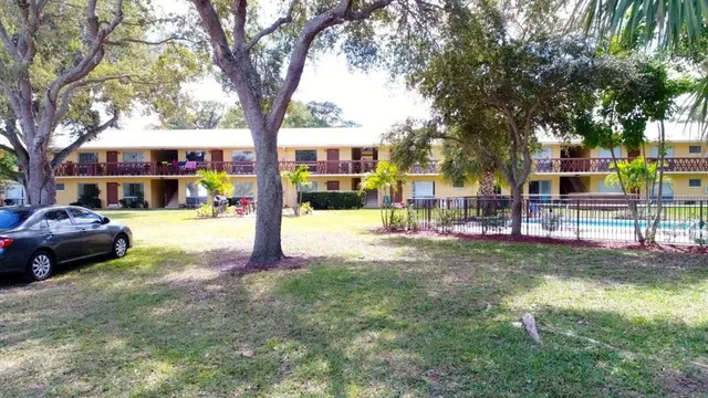 a view of street with parked cars