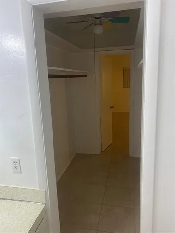 a bathroom with a glass door shower