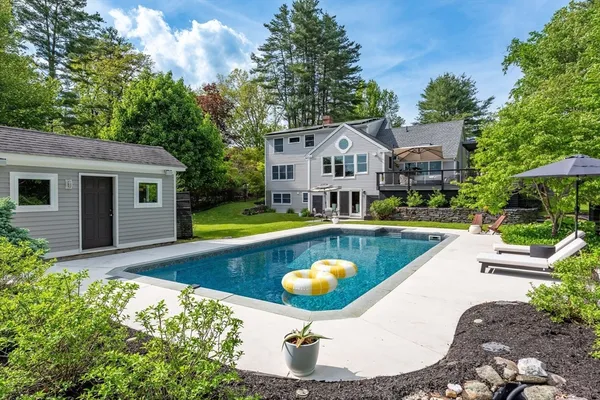 a view of a house with swimming pool