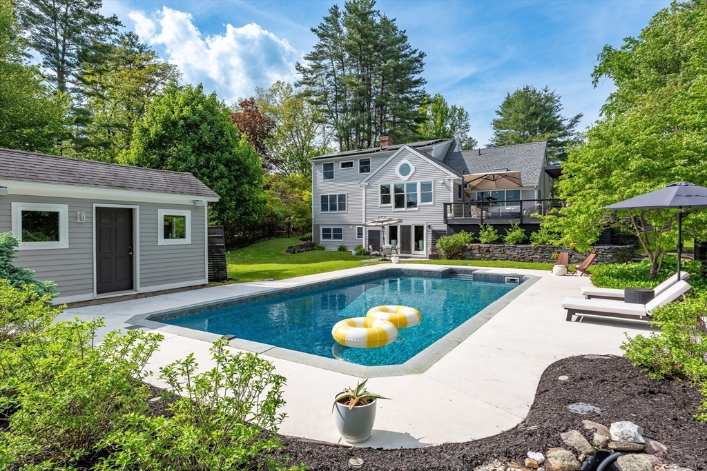 585 Station Road Amherst, MA 01002 - Photo 1 of 42 a view of a house with swimming pool
