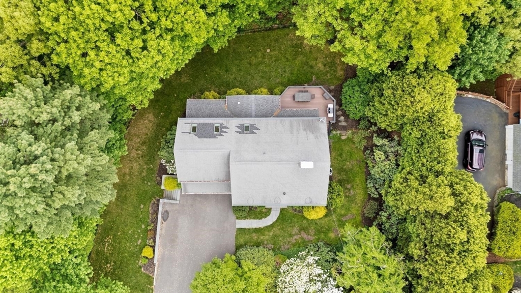 105 Thornberry Road Winchester, MA 01890 - Photo 35 of 35 an aerial view of a house with a yard basket ball court and outdoor seating