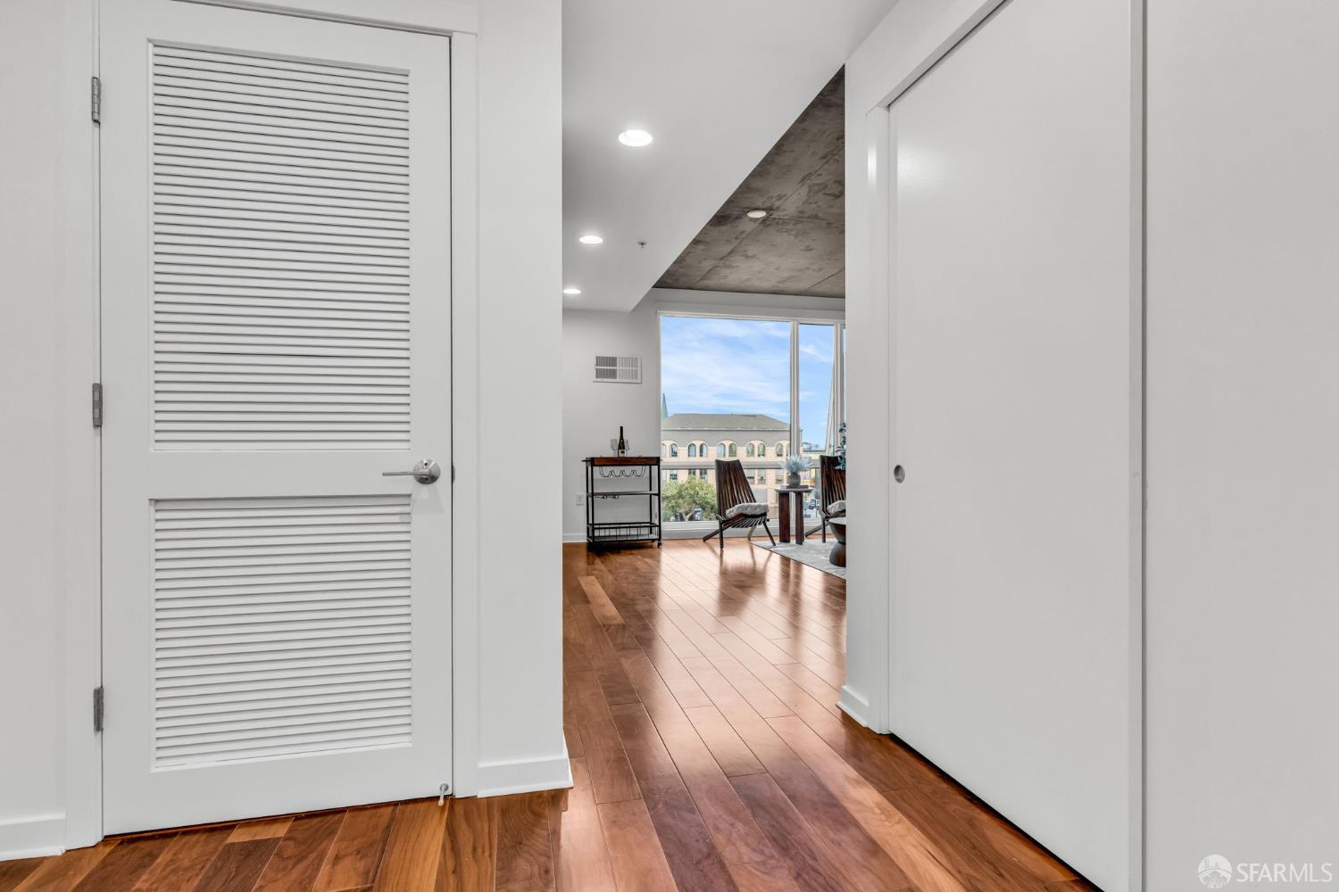 45 Bartlett Street, Unit 416 San Francisco, CA 94110 - Photo 15 of 36 a view of dining room with furniture and wooden floor